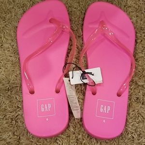 Neon pink Gap flip flops